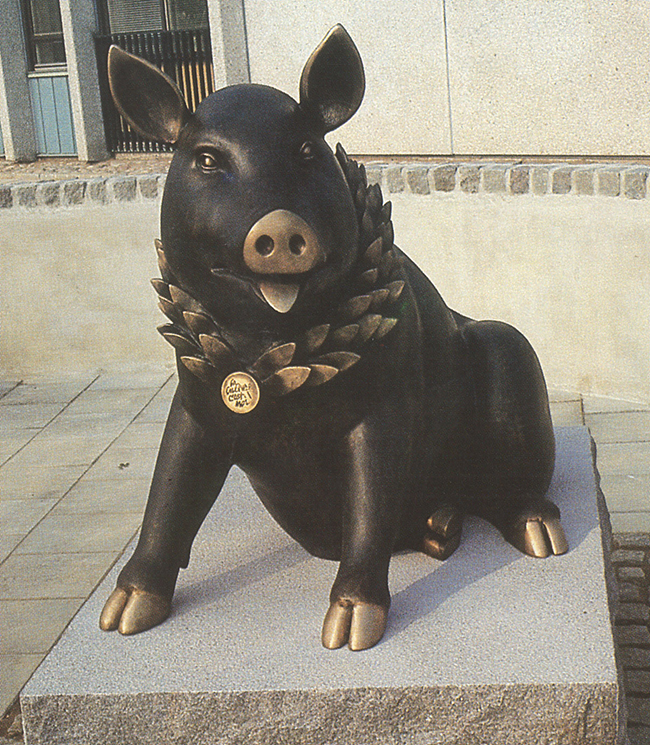 En bild på konstverket La
culture c’est moi, som föreställer en gris. 