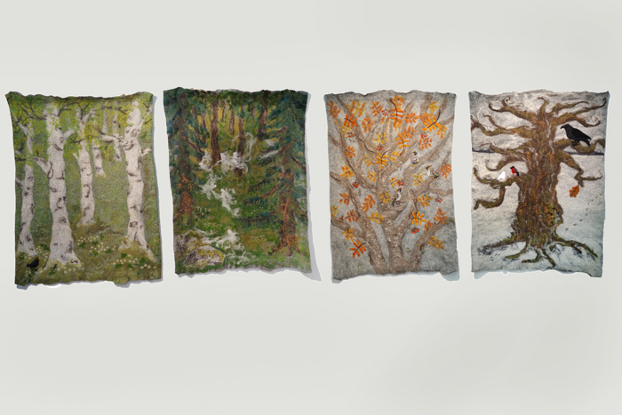 4 större textila verk i ull föreställande de 4 årstidernas olika naturväxlingar