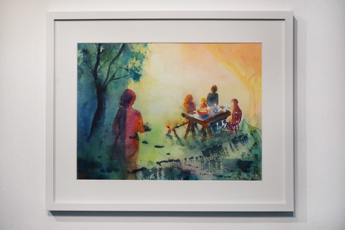 Akvarellmålning föreställande en grupp människor vid ett uppdukat bord utomhus