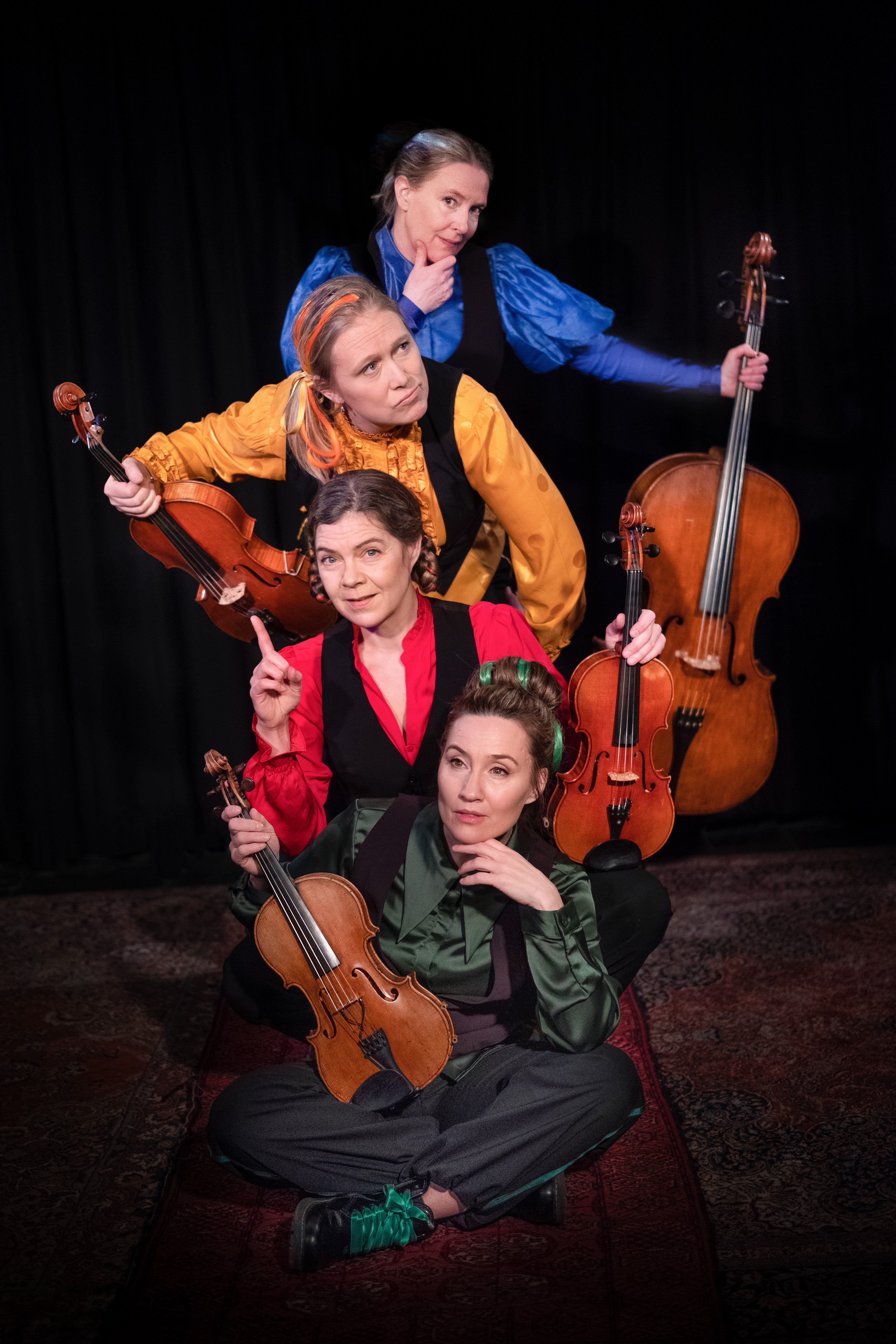 Fyra kvinnor med olika instrument